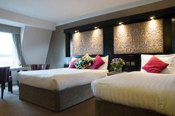 Triple Room – One Double and One Single Bed