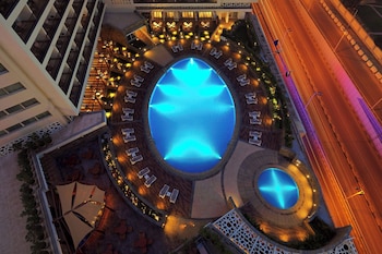 Deluxe Guest room, 1 King, Pool & City view, Balcony