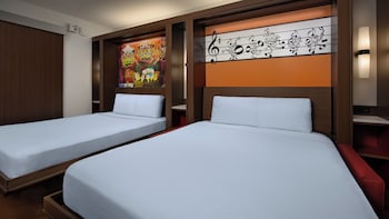 Family Suite. Wheelchair accessible with tub and option for hearing accessibility.  1 queen bed, 2 q
