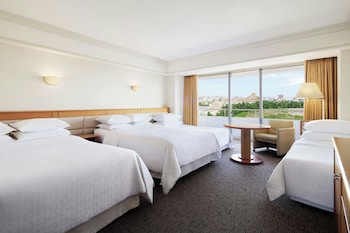 Guest room, 4 Twin Beds, Disney or Bay view, Main Building, Balcony