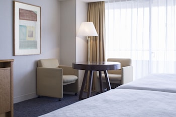 Guest room, 4 Twin Beds, Disney or Bay view, Main Building, Balcony