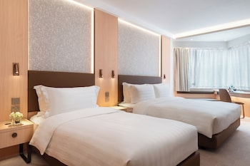 Newly Renovated Deluxe Room with One Double Bed and One Single Bed