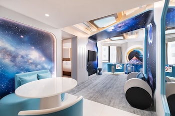 Newly Renovated Space Theme Suite with Queen Bed