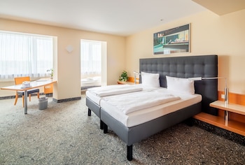 Studio Deluxe Triple Room