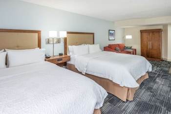 Two queen size bed with a queen size sofa bed