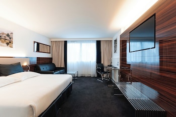 Chambre EXECUTIVE grand lit et canapé-lit pour enfant de 12 ans maximum