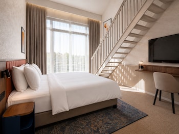 Duplex Family Room 1 King Bed, Twin Beds, Balcony