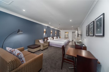 Standard Family Room – 4 People + Light Breakfast placed in Room